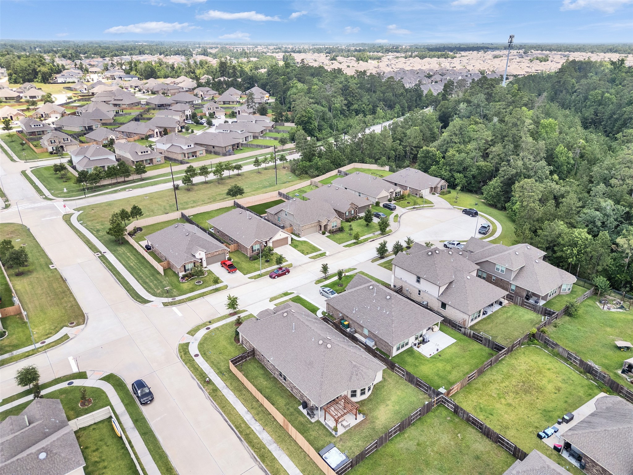 27997 Lone Hollow Lane Spring, TX 77386 - Photo 44 of 45 an aerial view of residential houses with outdoor space