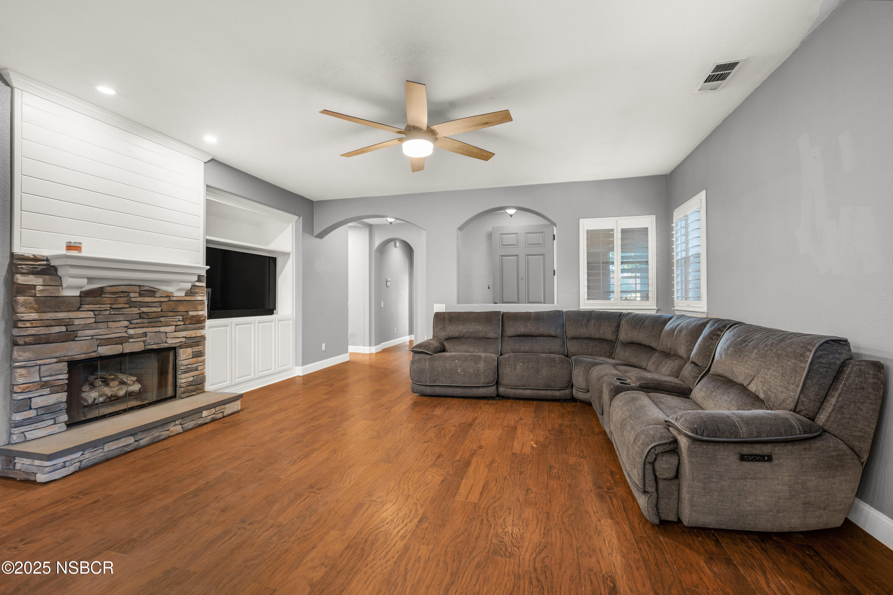 758 Voyager Road Lompoc, CA 93436 - Photo 12 of 46 a living room with furniture and a fireplace