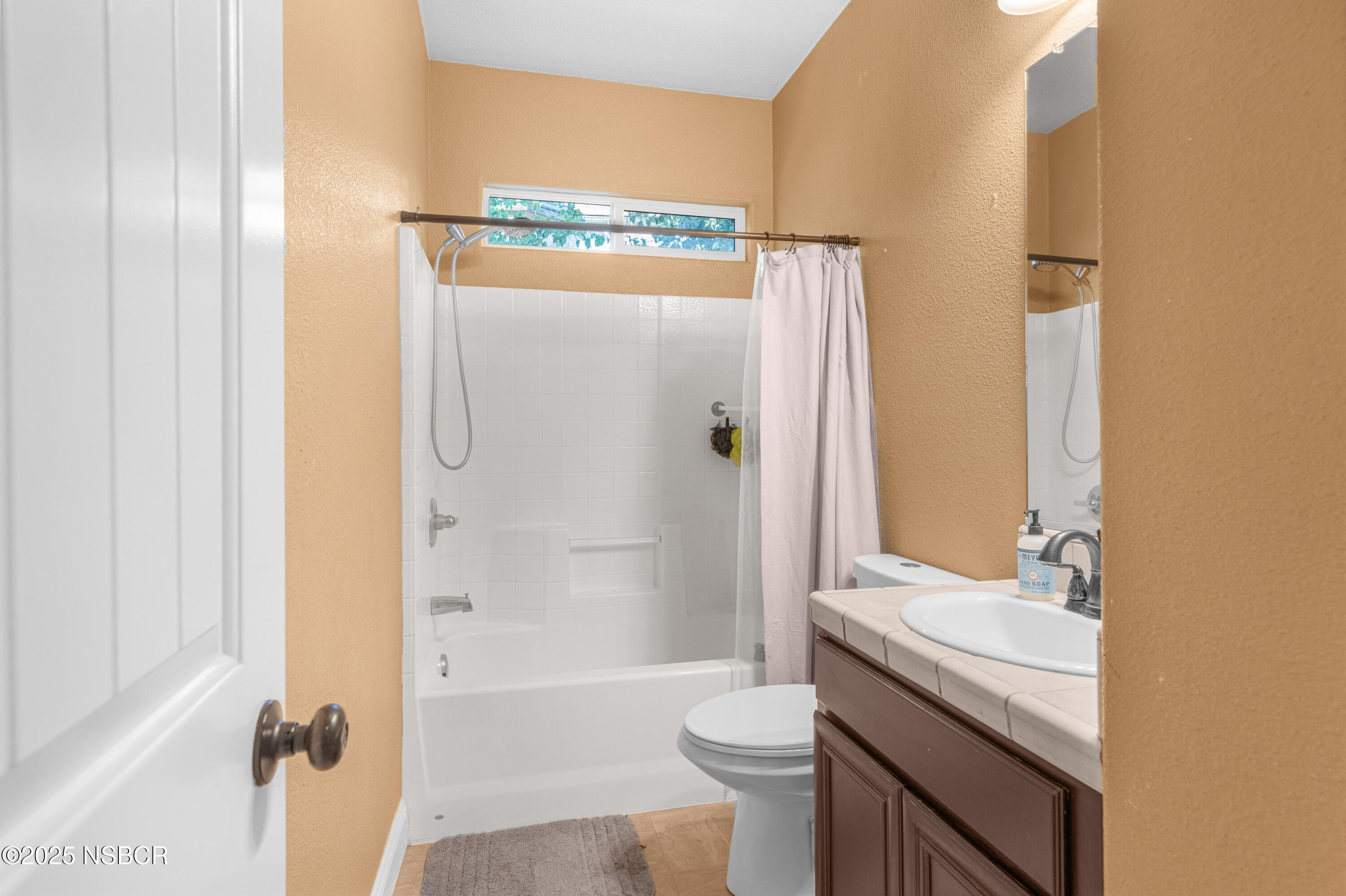 758 Voyager Road Lompoc, CA 93436 - Photo 31 of 46 a bathroom with a granite countertop sink toilet and shower