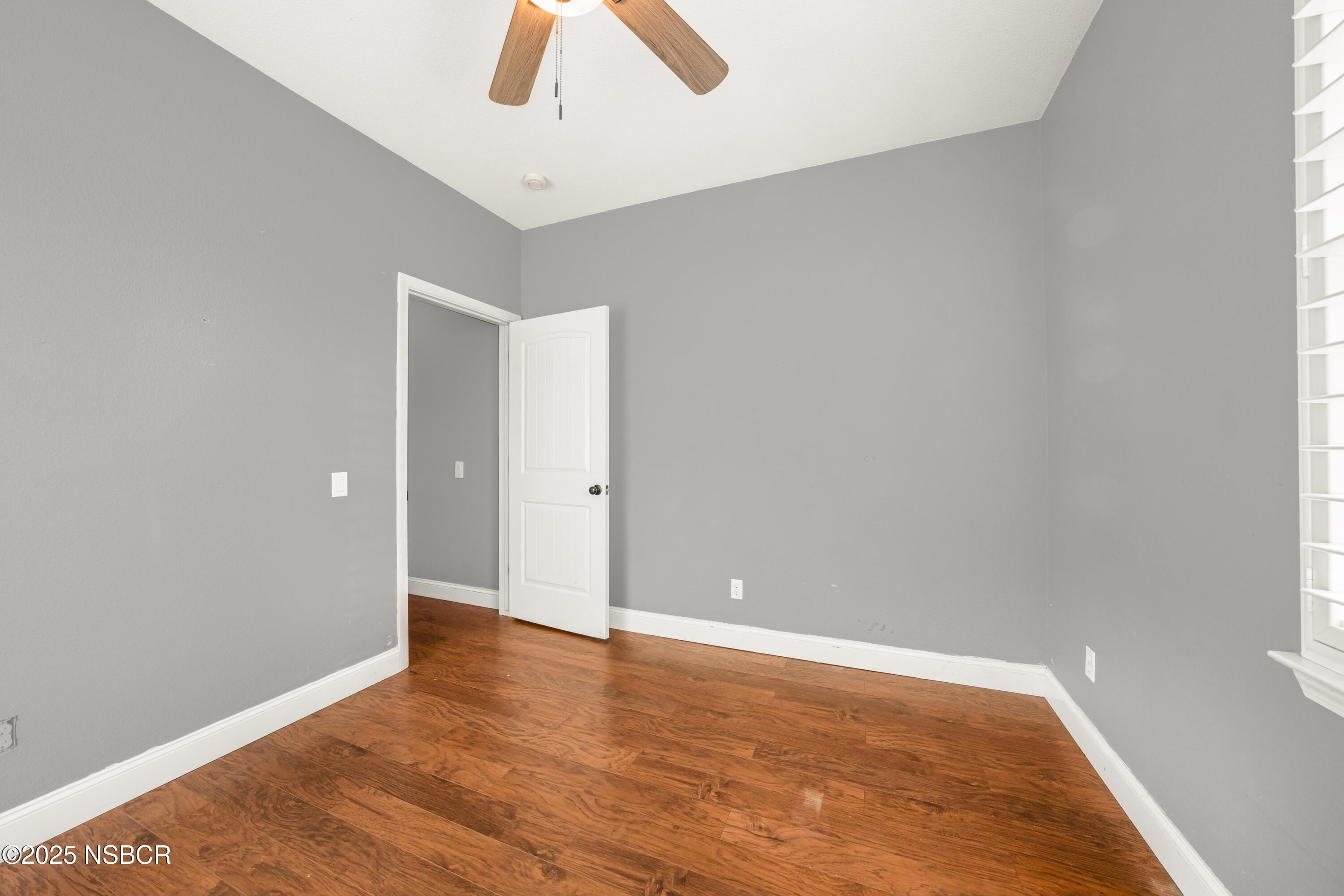 758 Voyager Road Lompoc, CA 93436 - Photo 33 of 46 a view of an empty room with wooden floor