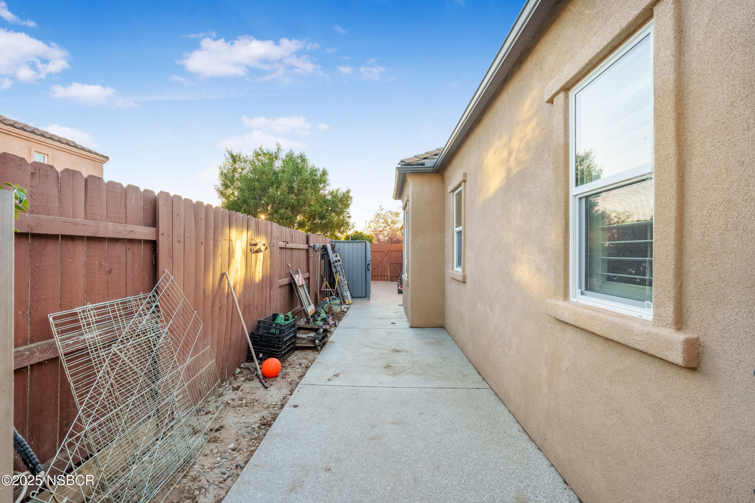 758 Voyager Road Lompoc, CA 93436 - Photo 40 of 46 a view of a house with a backyard