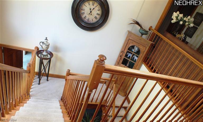 33699 Pinetree Road Cleveland, OH 44124 - Photo 11 of 20 Angle of staircase to capture the dramatic look of the wood and light, open feel!