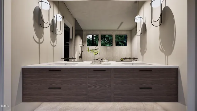 a bathroom with a sink a window and a shower