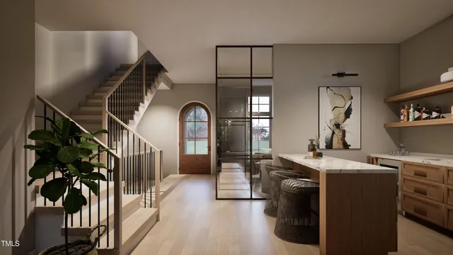 a view of white house with a yard and plants