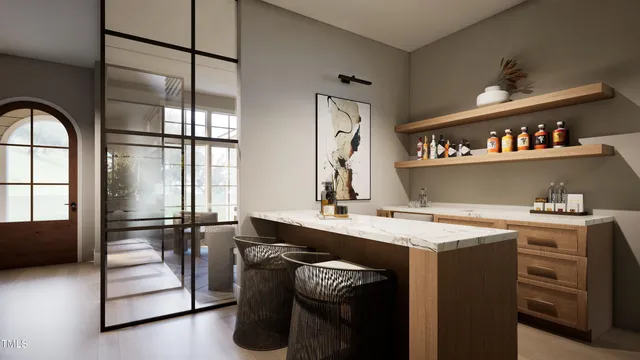 a view of a livingroom with washer and dryer