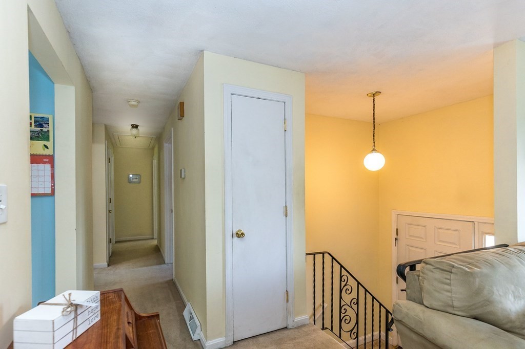 3 Stage Road Billerica, MA 01862 - Photo 13 of 26 a view of a hallway with bathroom and a livingroom
