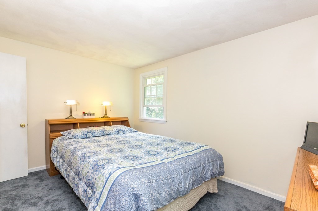 3 Stage Road Billerica, MA 01862 - Photo 15 of 26 a bedroom with a bed and window