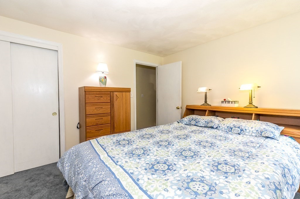 3 Stage Road Billerica, MA 01862 - Photo 16 of 26 a bedroom with a bed and cabinets