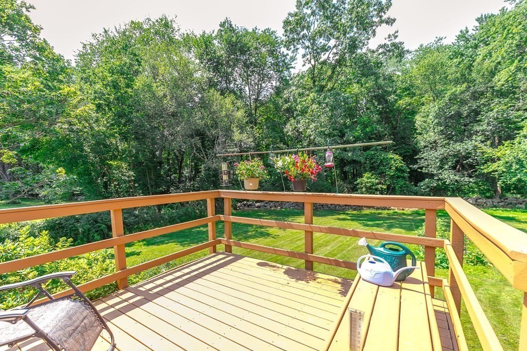 3 Stage Road Billerica, MA 01862 - Photo 24 of 26 a view of balcony with wooden floor and fence