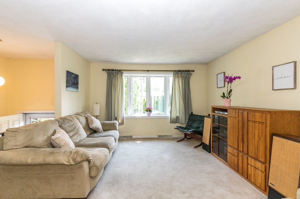 3 Stage Road Billerica, MA 01862 - Photo 4 of 26 a living room with furniture and a window