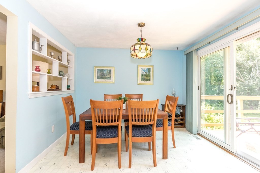 3 Stage Road Billerica, MA 01862 - Photo 8 of 26 a view of a dining room with furniture wooden floor and chandelier