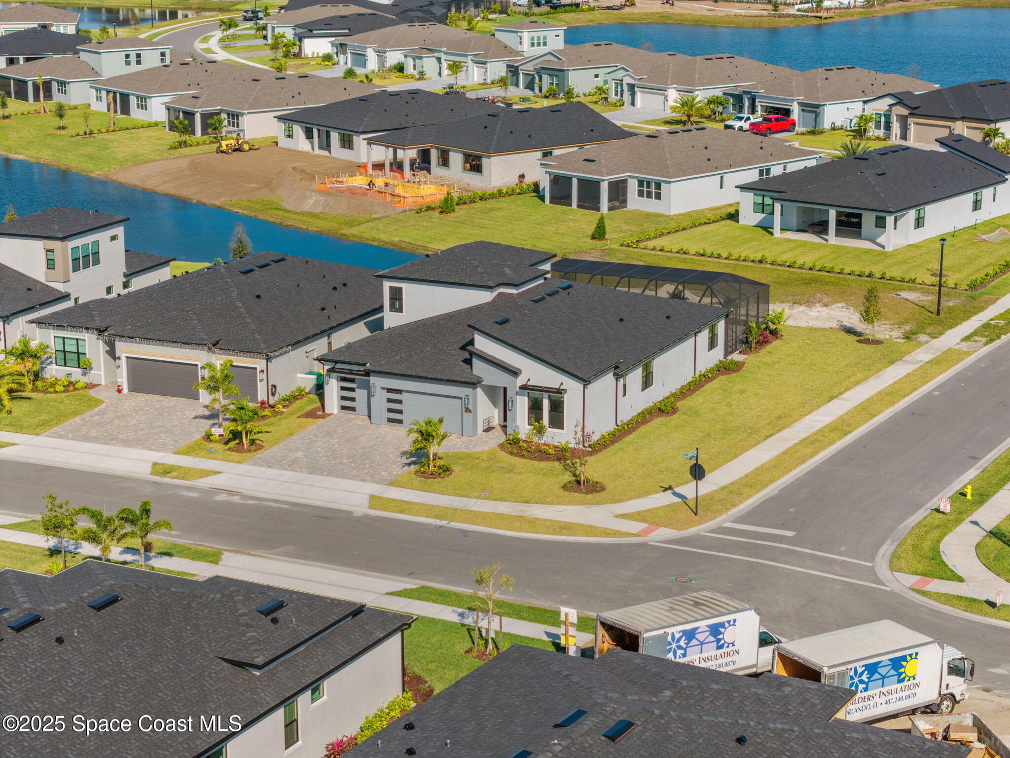 2846 Silverlefe Lane Melbourne, FL 32940 - Photo 3 of 58 an aerial view of a house with a swimming pool