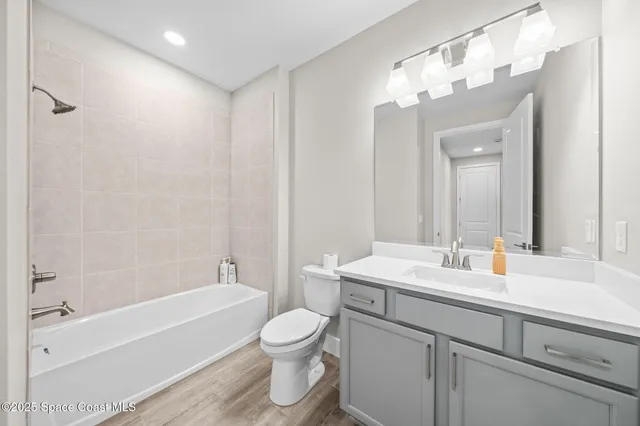 a view of a storage & utility room with a sink