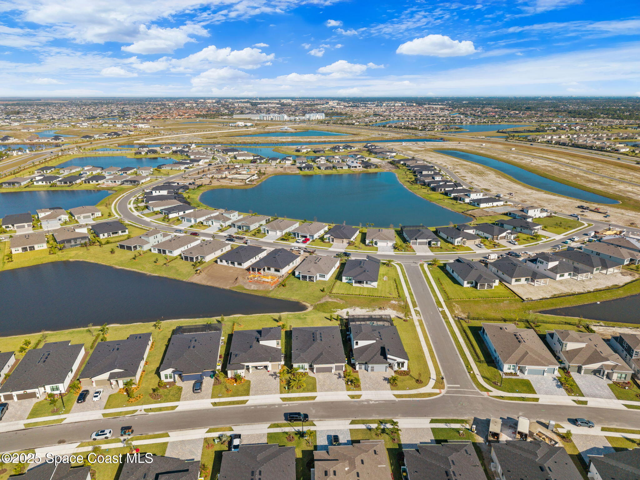 2846 Silverlefe Lane Melbourne, FL 32940 - Photo 50 of 58 a view of a city with an ocean