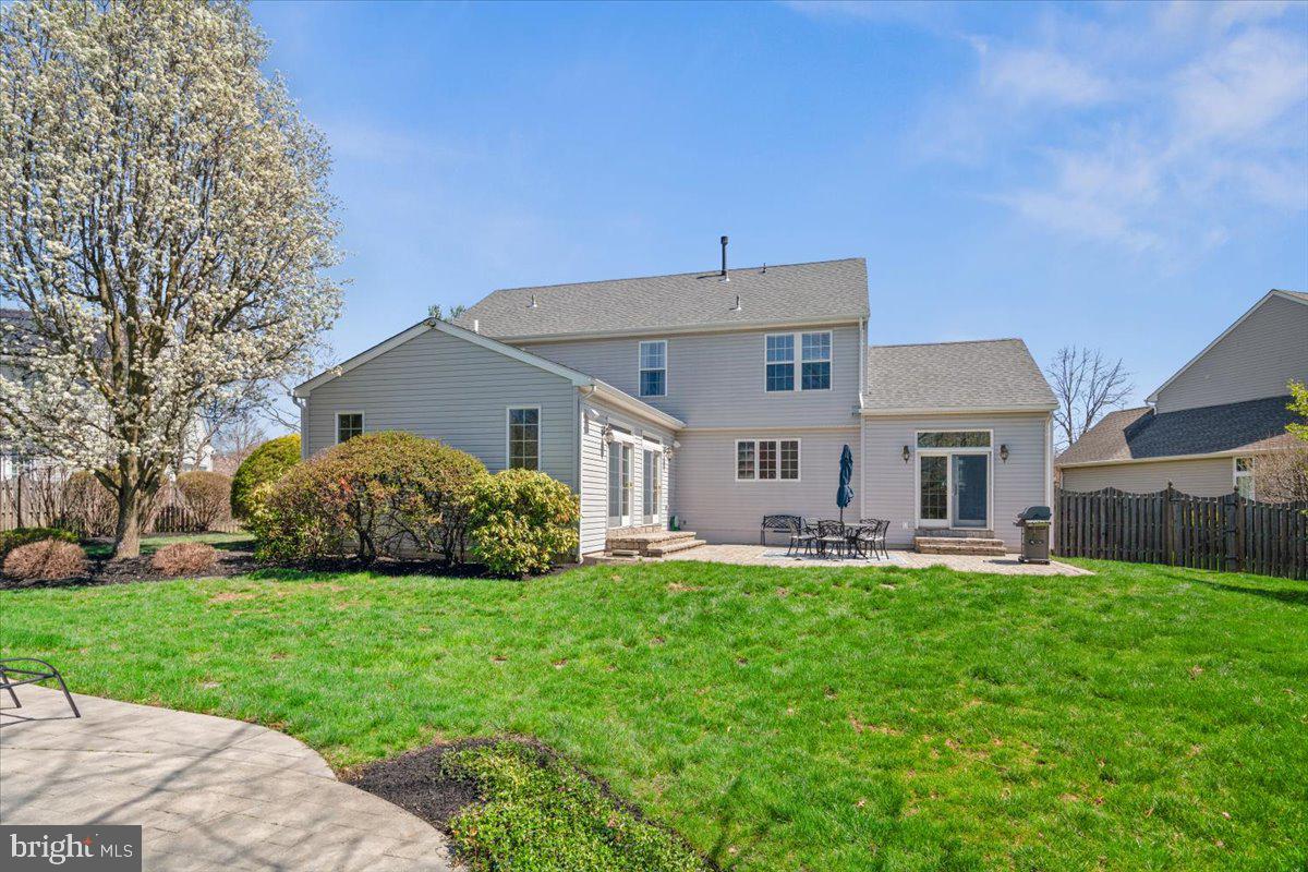 5 Masters Way Pennington, NJ 08534 - Photo 52 of 56 a front view of house with yard and green space