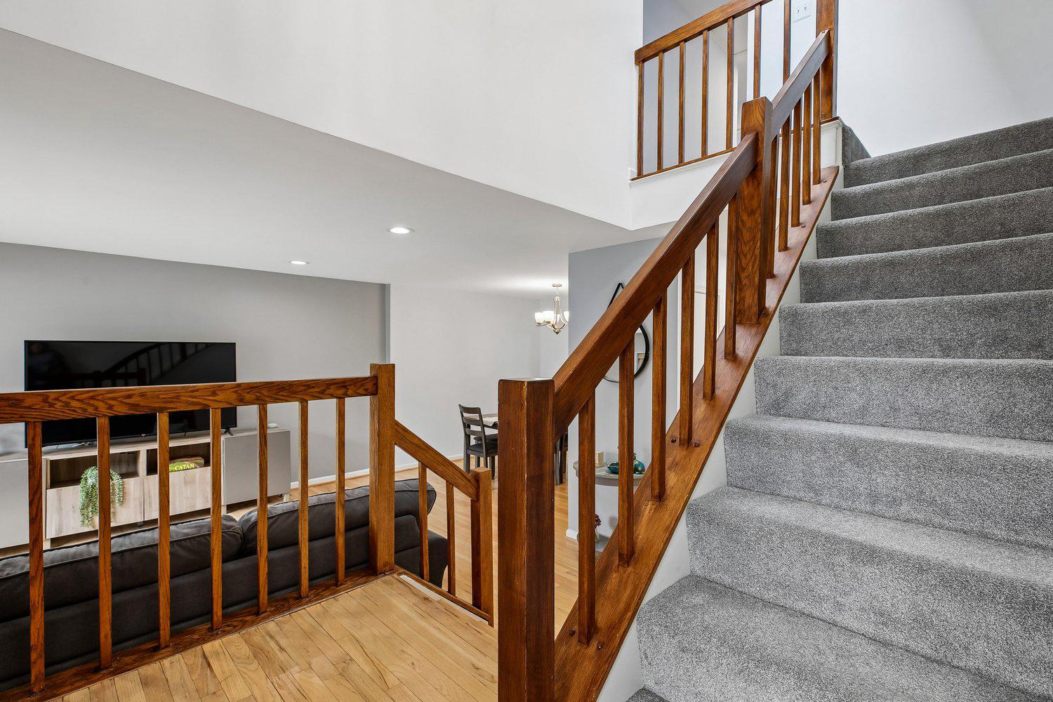1406 Casino Circle Silver Spring, MD 20906 - Photo 23 of 64 Stairs with warm wooden accents to Upper Level.