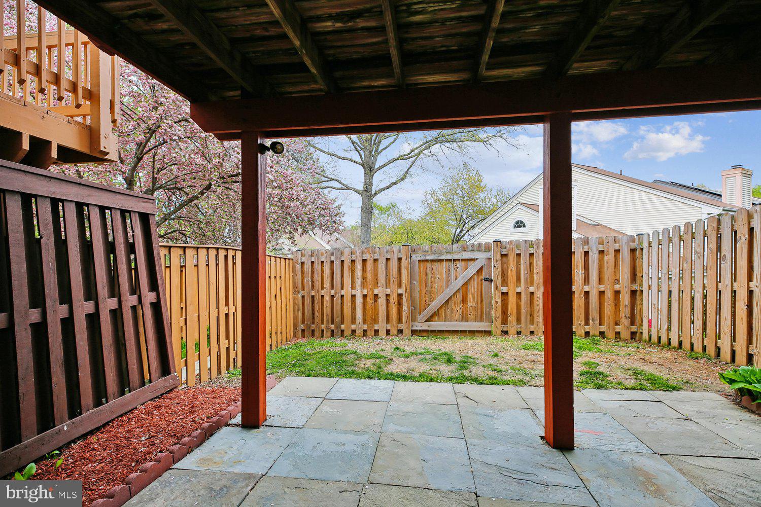 1406 Casino Circle Silver Spring, MD 20906 - Photo 46 of 64 Serene backyard retreat with blooming trees.