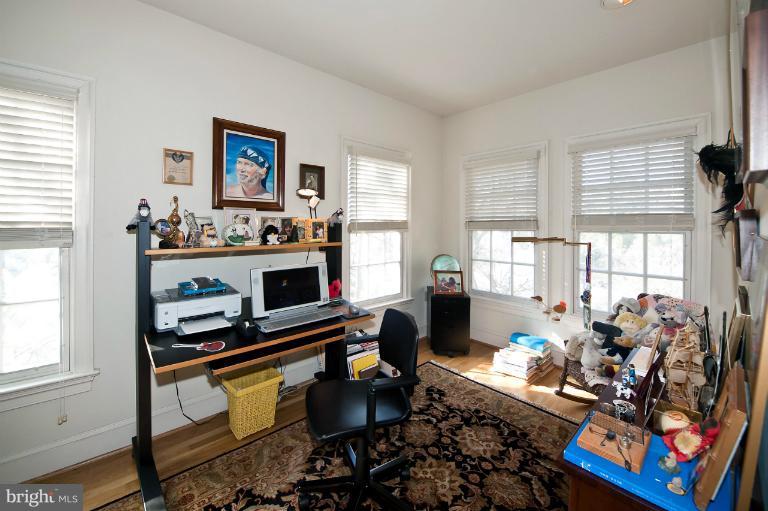 1626 Foxhall Road Northwest Washington, DC 20007 - Photo 2 of 21 a living room with furniture fireplace and window