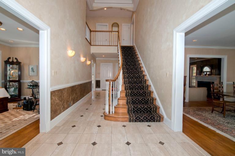 1626 Foxhall Road Northwest Washington, DC 20007 - Photo 17 of 21 a view of entryway and hall with wooden floor