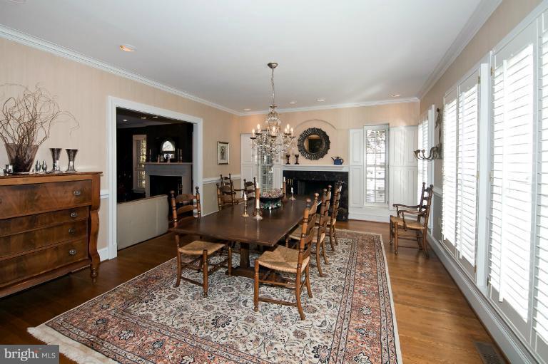 1626 Foxhall Road Northwest Washington, DC 20007 - Photo 4 of 21 a view of a dining room with furniture window and wooden floor