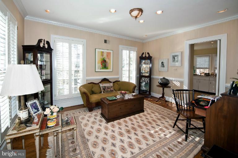 1626 Foxhall Road Northwest Washington, DC 20007 - Photo 7 of 21 a living room with furniture and a window