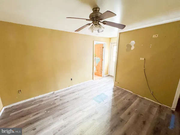 a view of a big room with wooden floor