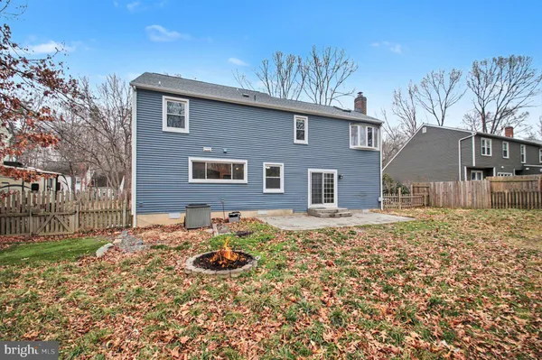 a backyard of a house with seating space