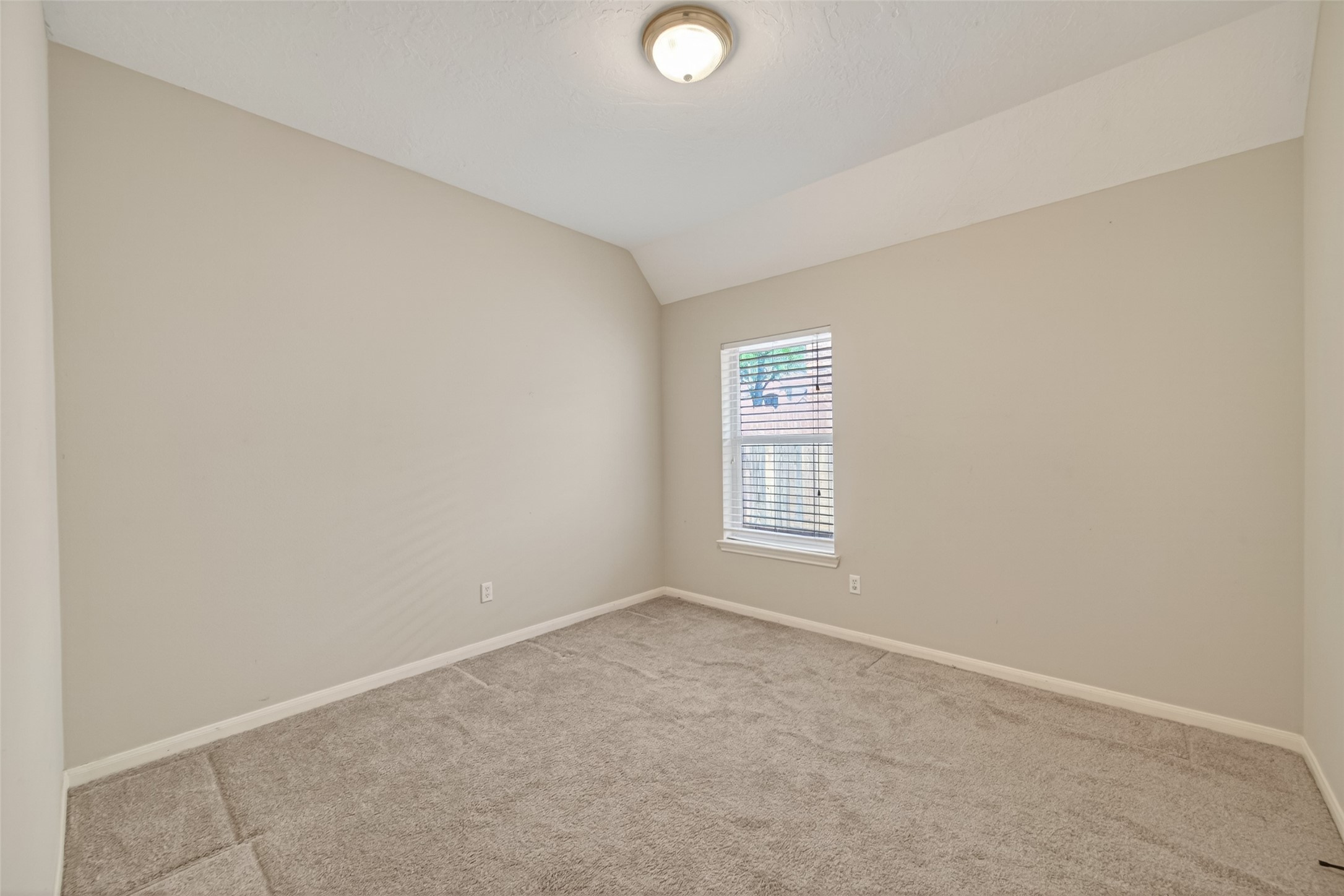 23211 Goldensong Court Spring, TX 77373 - Photo 38 of 46 an empty room with a window