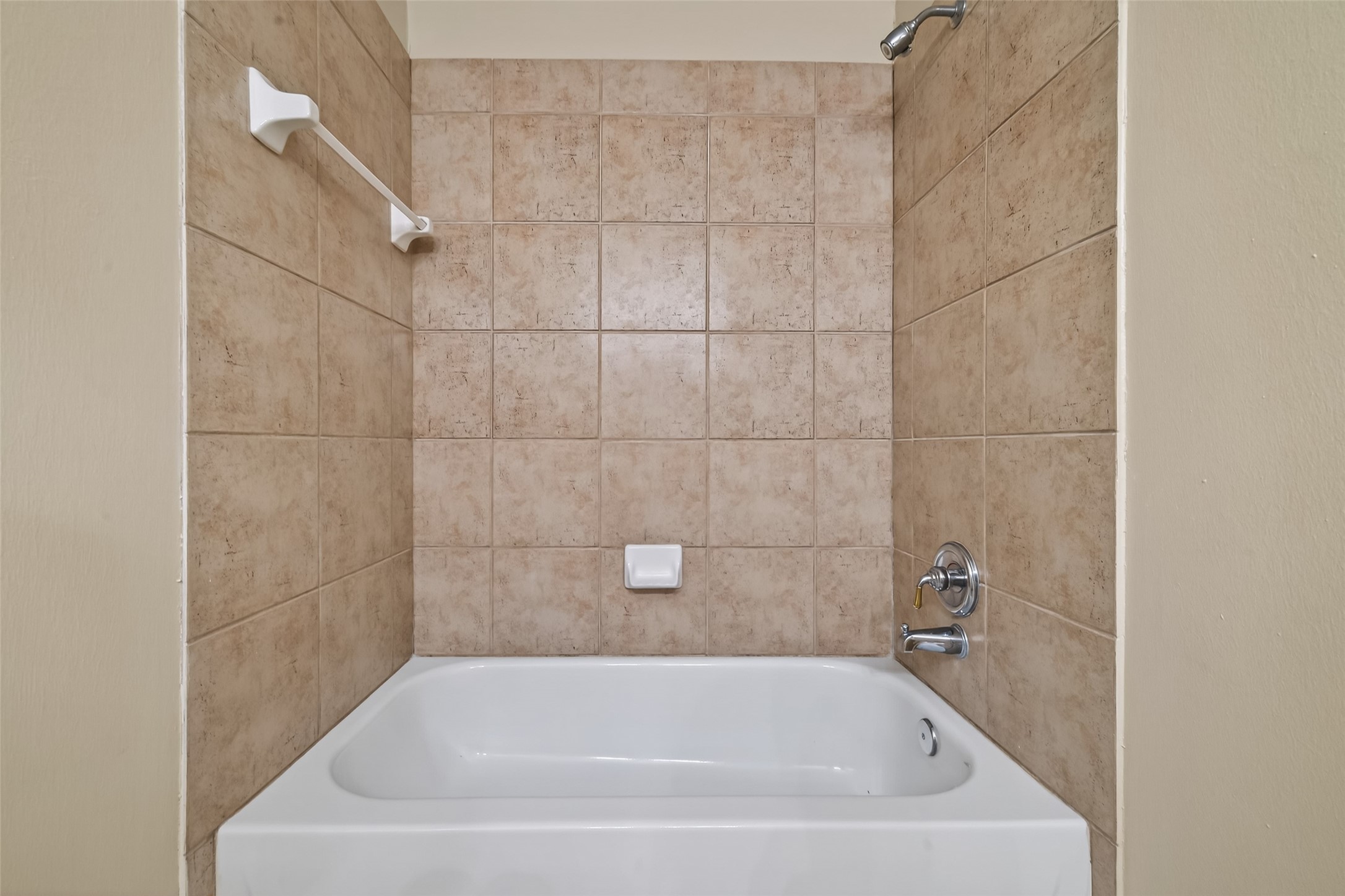 23211 Goldensong Court Spring, TX 77373 - Photo 41 of 46 a white bath tub sitting in a bathroom and shower