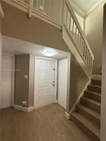 an entryway with a stairs