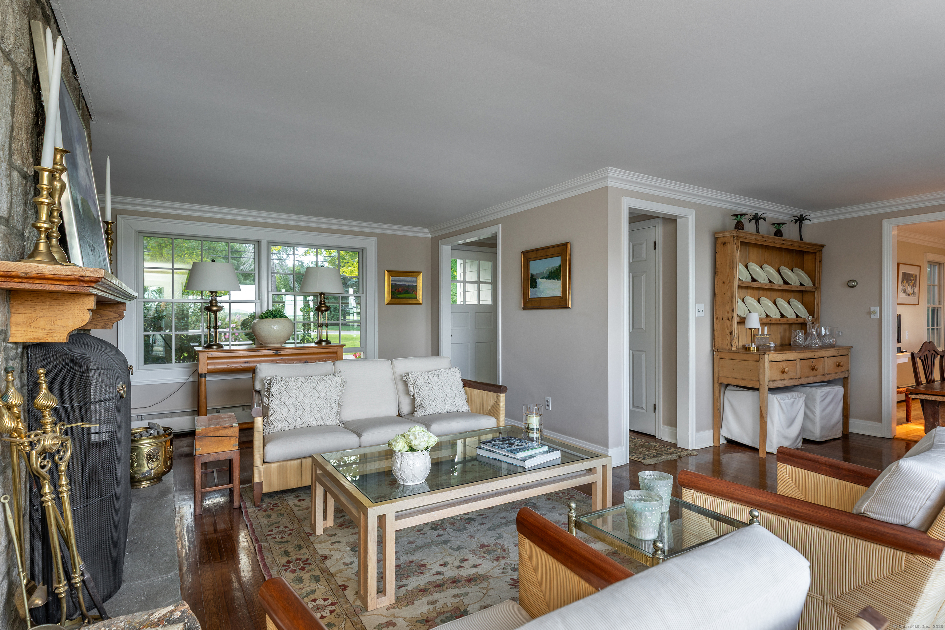 109 Church Hill Road Washington, CT 06794 - Photo 15 of 30 a living room with fireplace furniture and a large window
