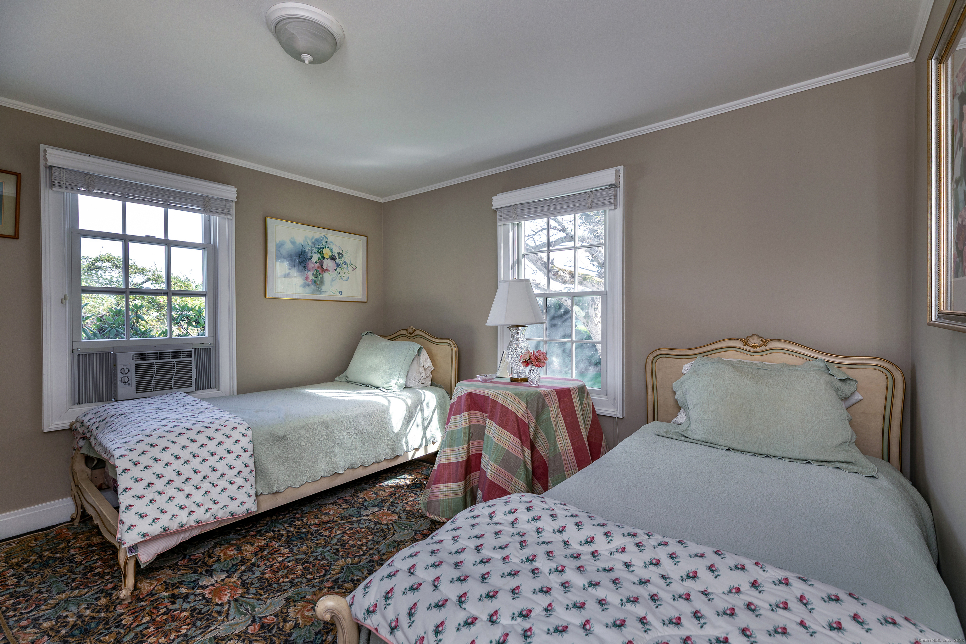 109 Church Hill Road Washington, CT 06794 - Photo 20 of 30 a bedroom with two beds and a window