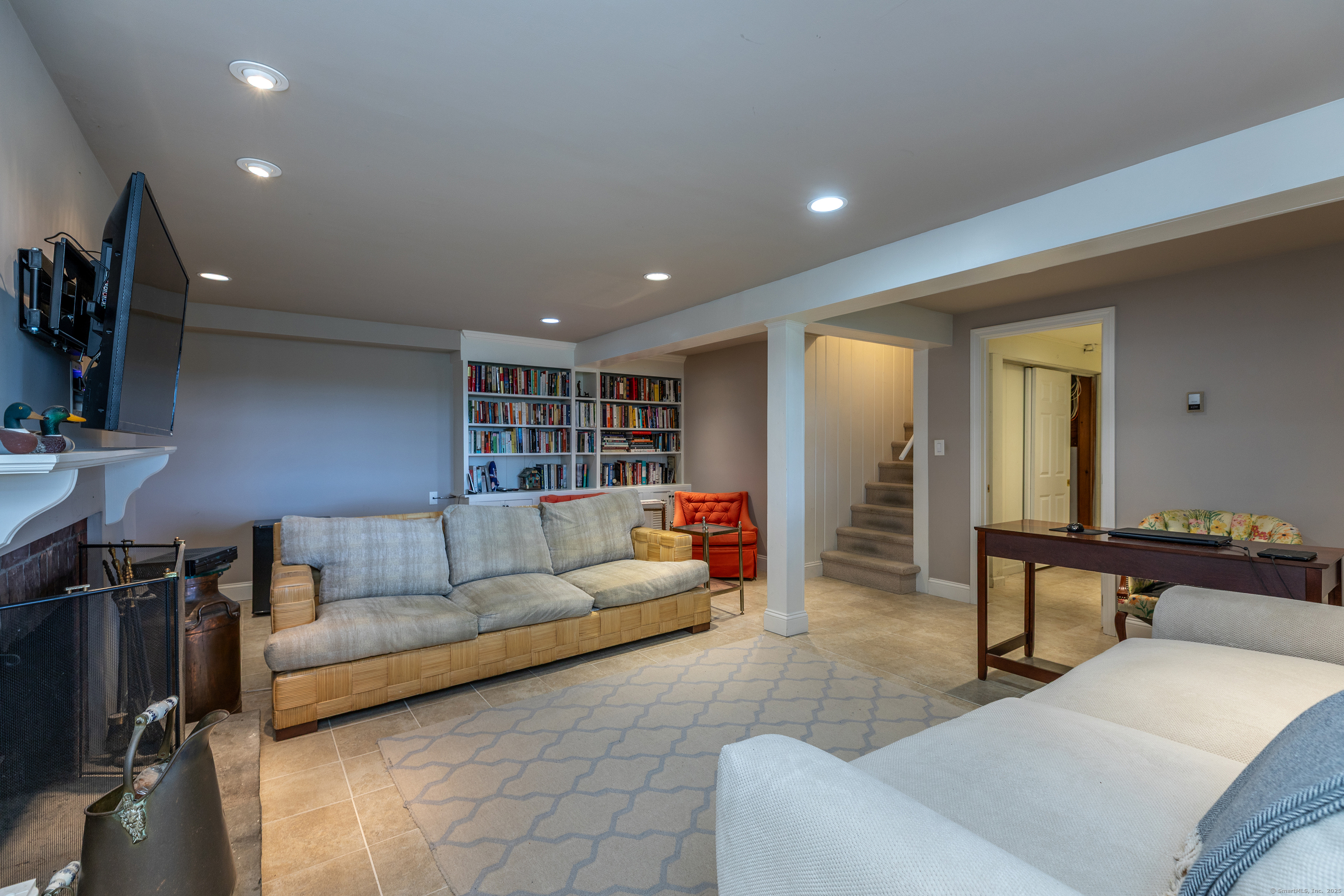 109 Church Hill Road Washington, CT 06794 - Photo 25 of 30 a living room with furniture and a flat screen tv