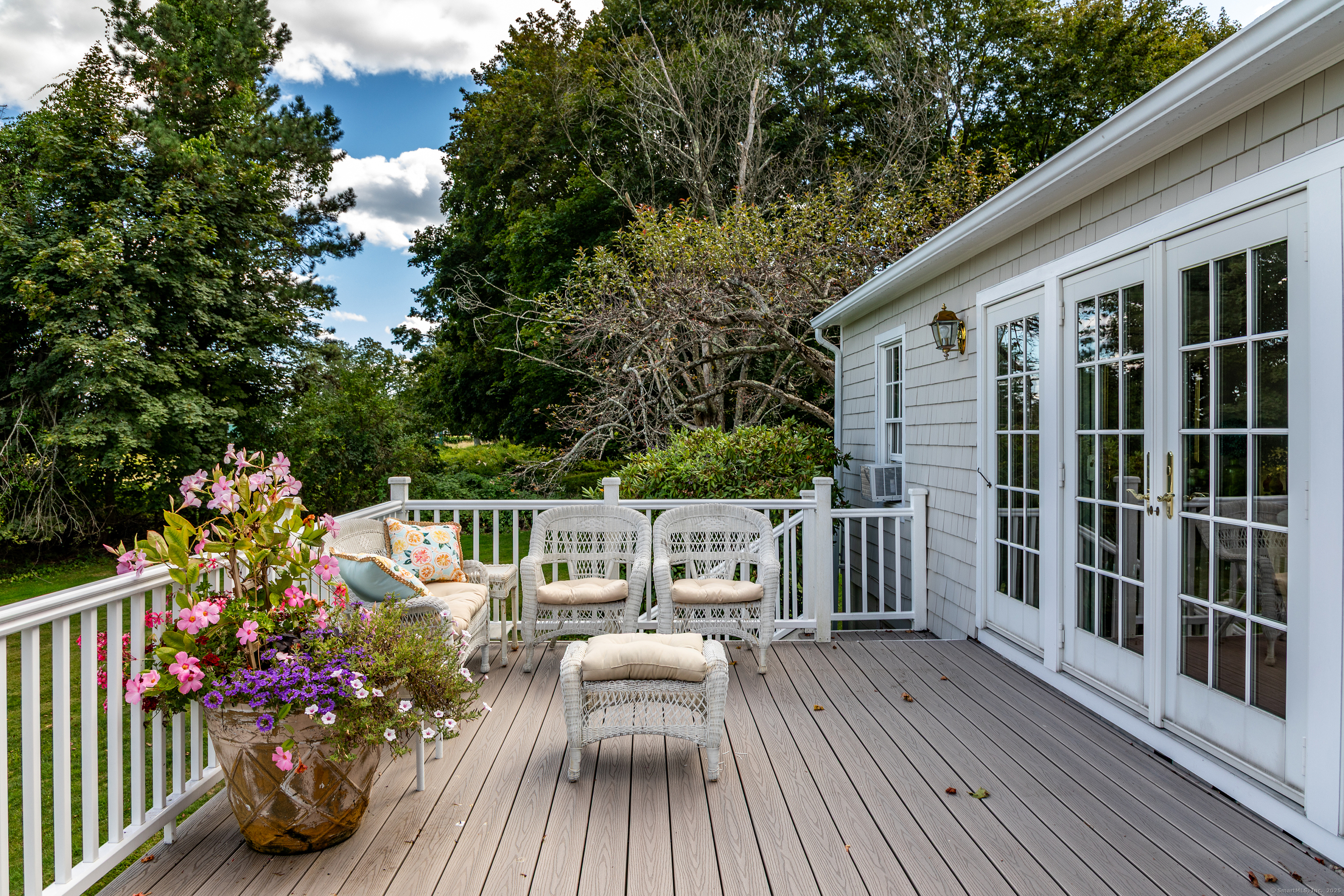 109 Church Hill Road Washington, CT 06794 - Photo 4 of 30 a view of balcony with seating space and wooden floor