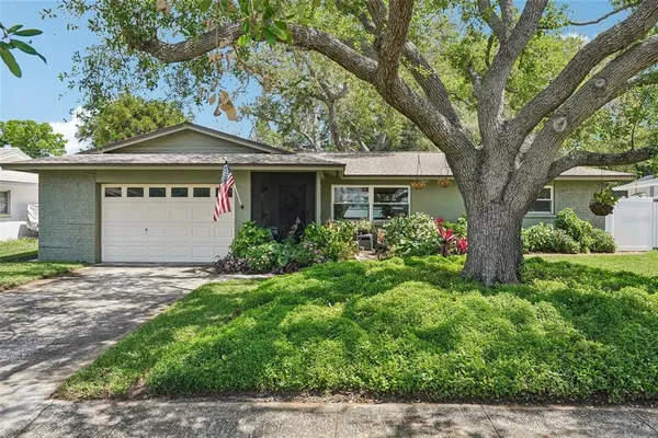 $419,900 | 11469 Imperial Groves Drive East, Largo, FL 33774