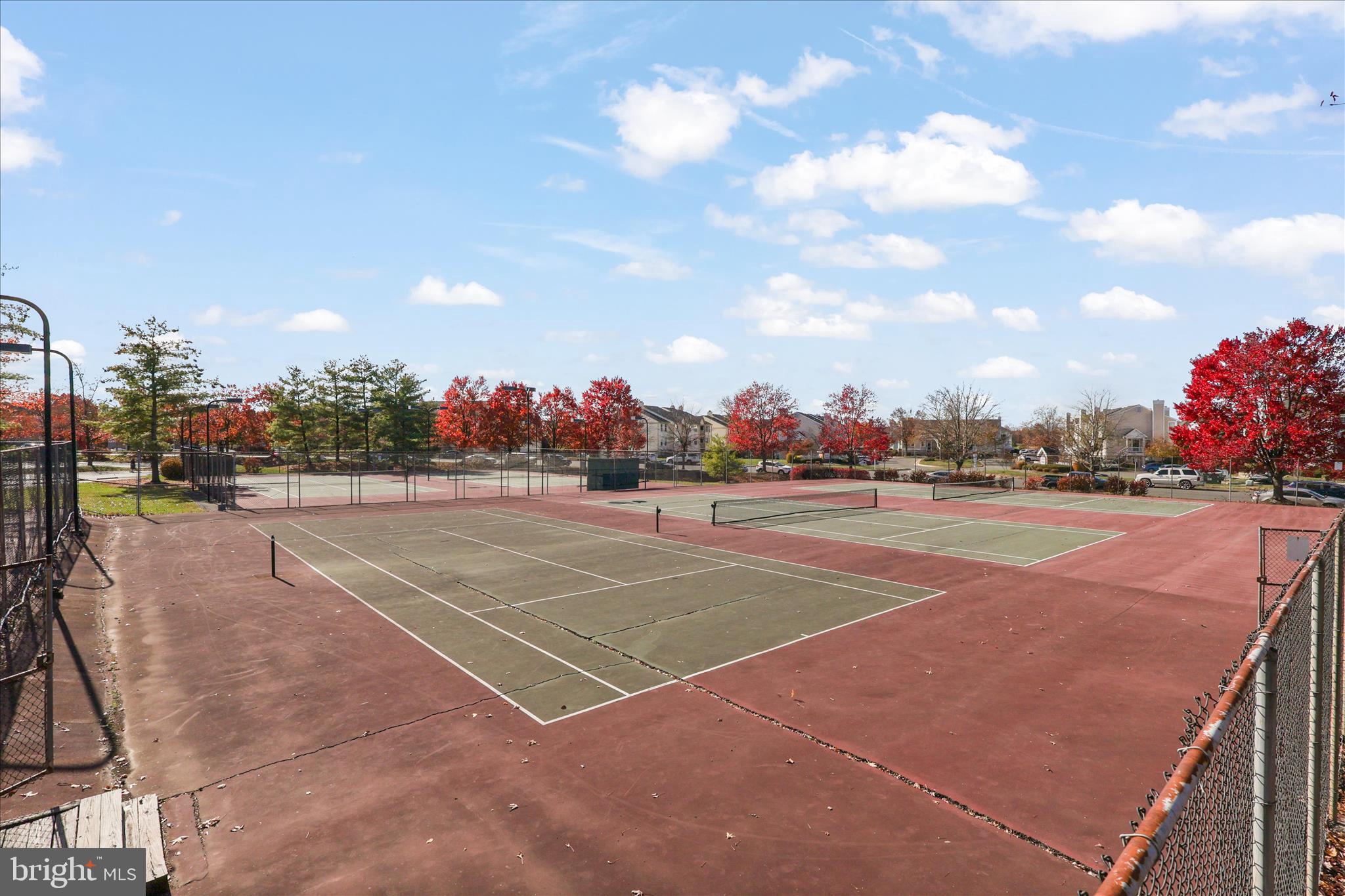 11002 Koman Circle, Unit 103 Manassas, VA 20109 - Photo 25 of 31 a view of a tennis court