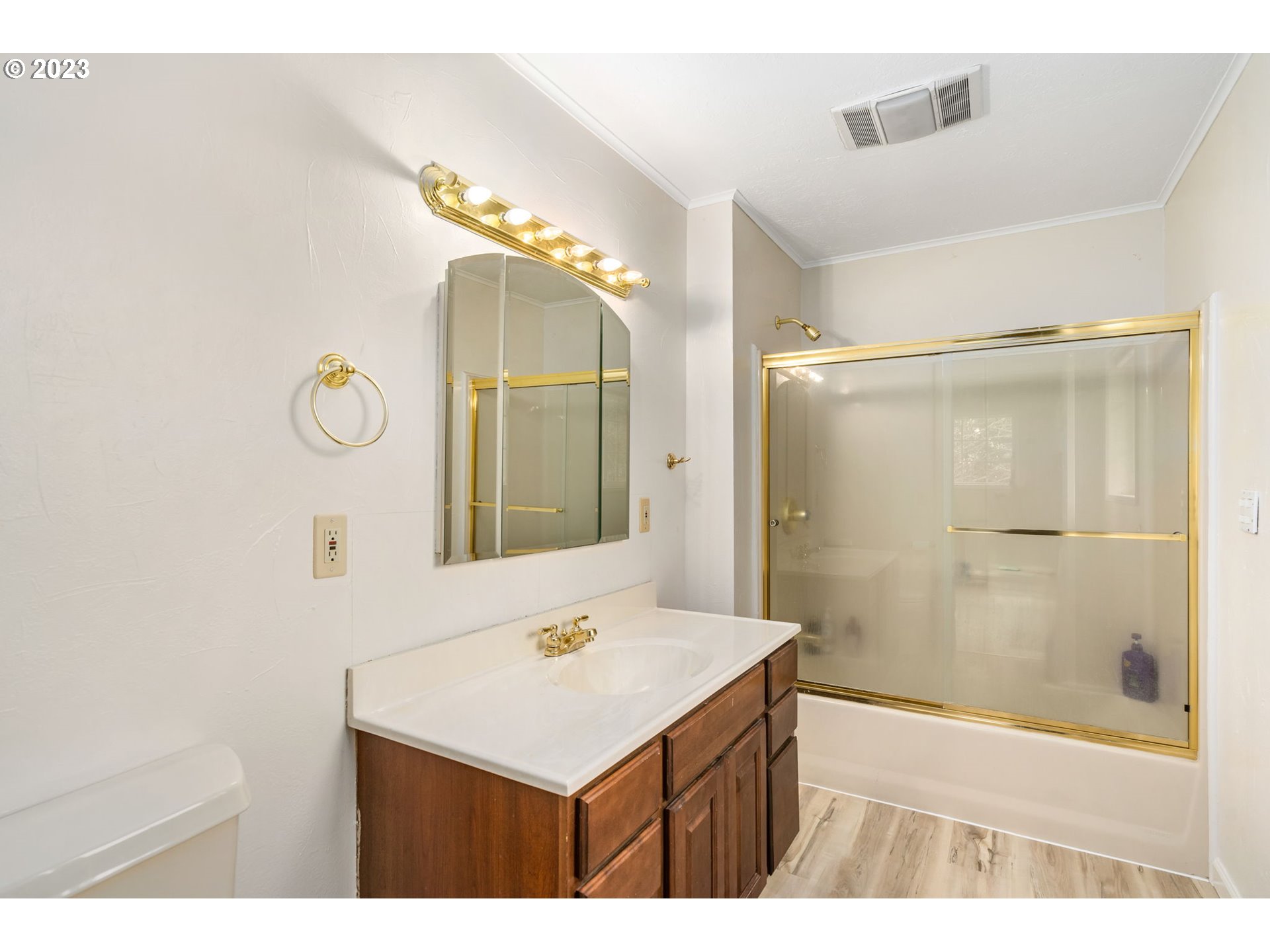 28268 Old Rainier Road Rainier, OR 97048 - Photo 15 of 28 a bathroom with a sink a light fixture and a mirror