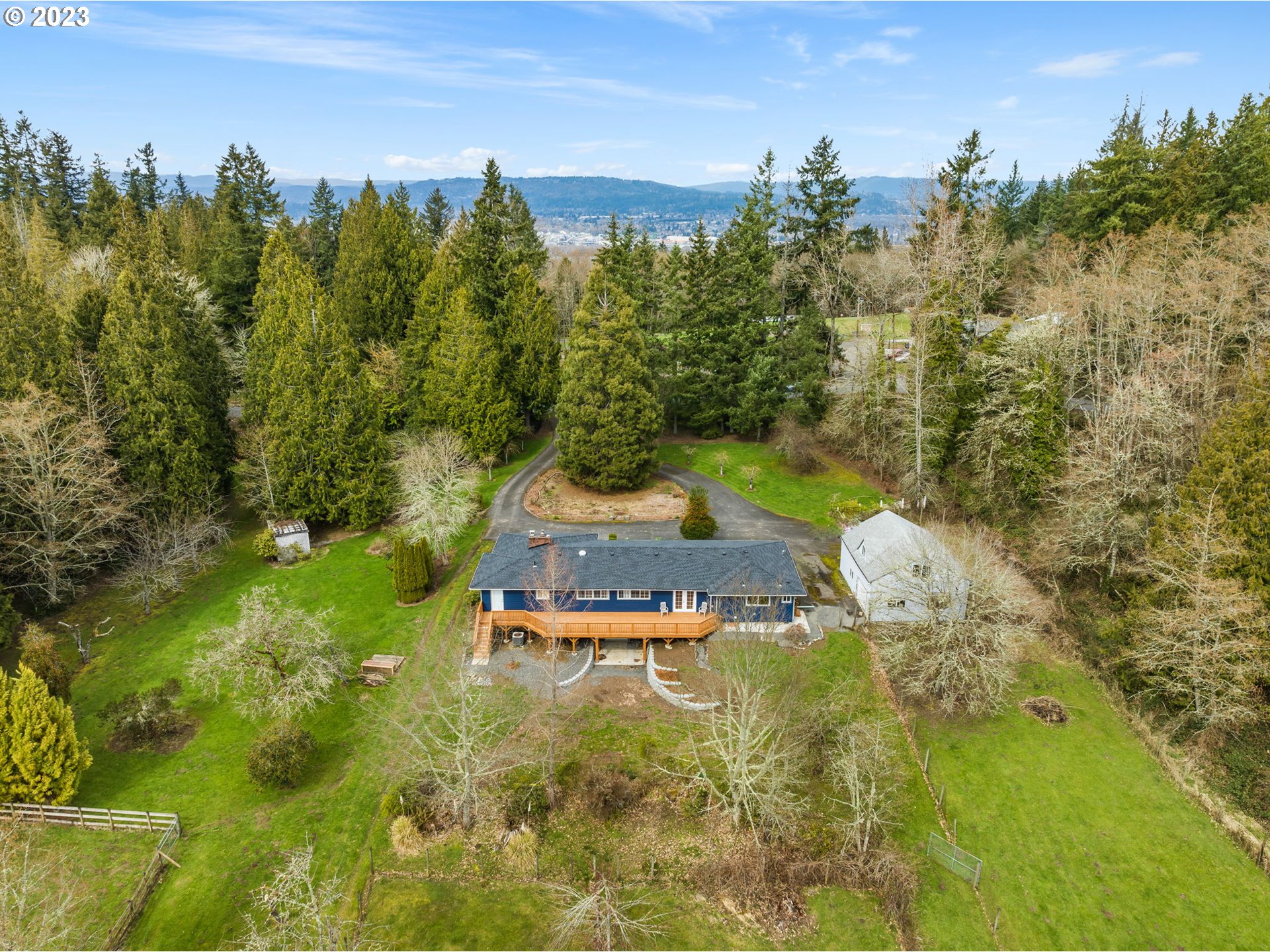 28268 Old Rainier Road Rainier, OR 97048 - Photo 2 of 28 a swimming pool with trees in the background