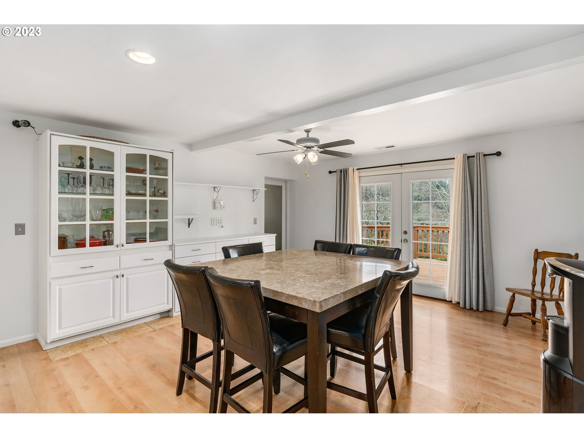 28268 Old Rainier Road Rainier, OR 97048 - Photo 5 of 28 a view of a dining room with furniture and wooden floor
