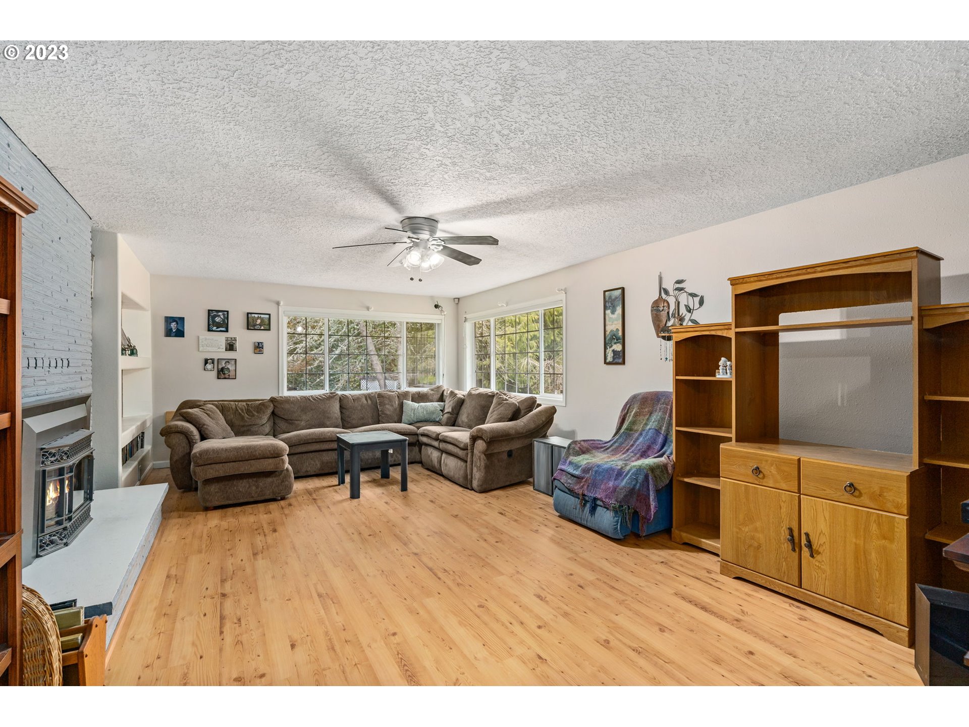 28268 Old Rainier Road Rainier, OR 97048 - Photo 7 of 28 a bedroom with furniture and wooden floor