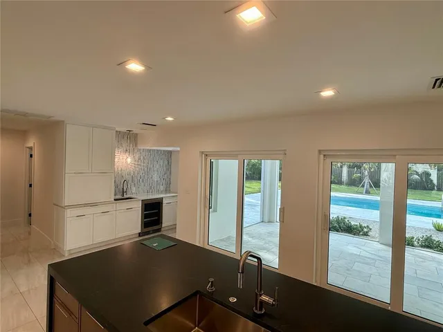 a living room with furniture and a gate