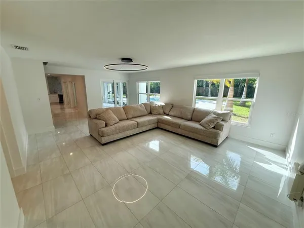 a view of an empty room and window