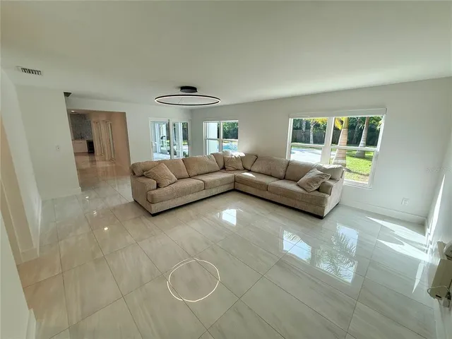 a view of an empty room and window