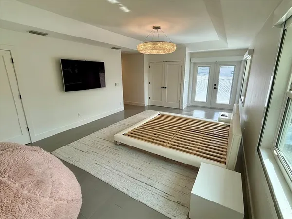 a view of room with wooden floor and window
