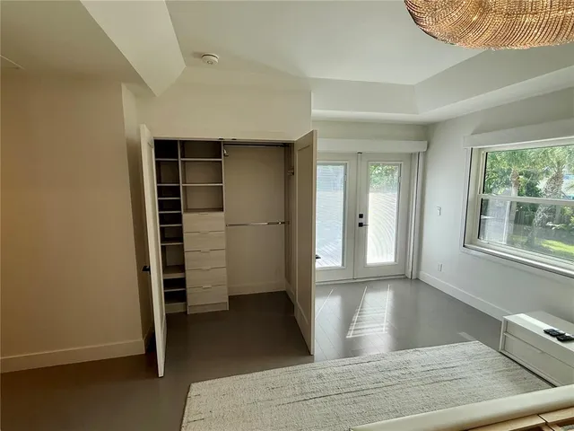 a bathroom with a tub a sink and a shower