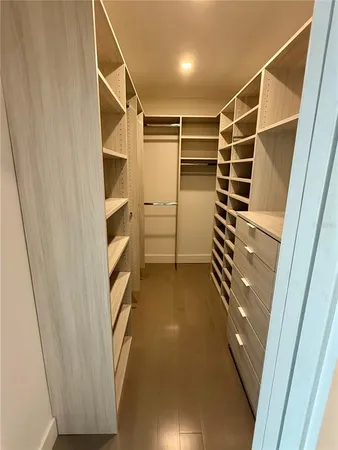 a white bath tub sitting in a bathroom