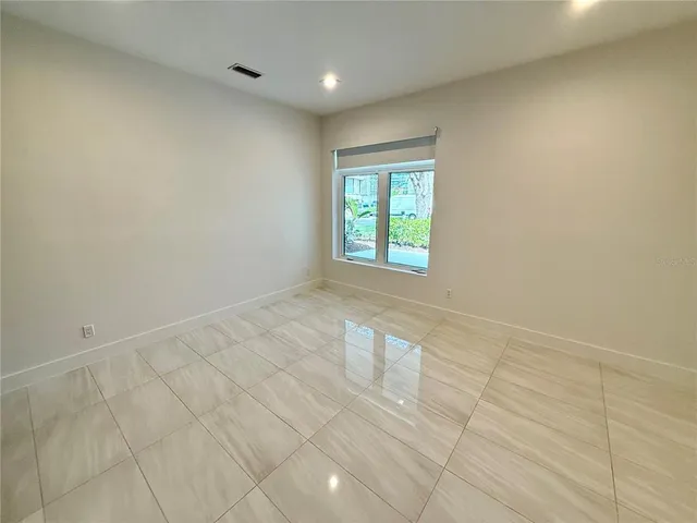 a view of a garden with a tree