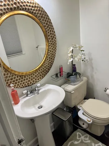 a kitchen with stainless steel appliances wooden cabinets a sink and a stove