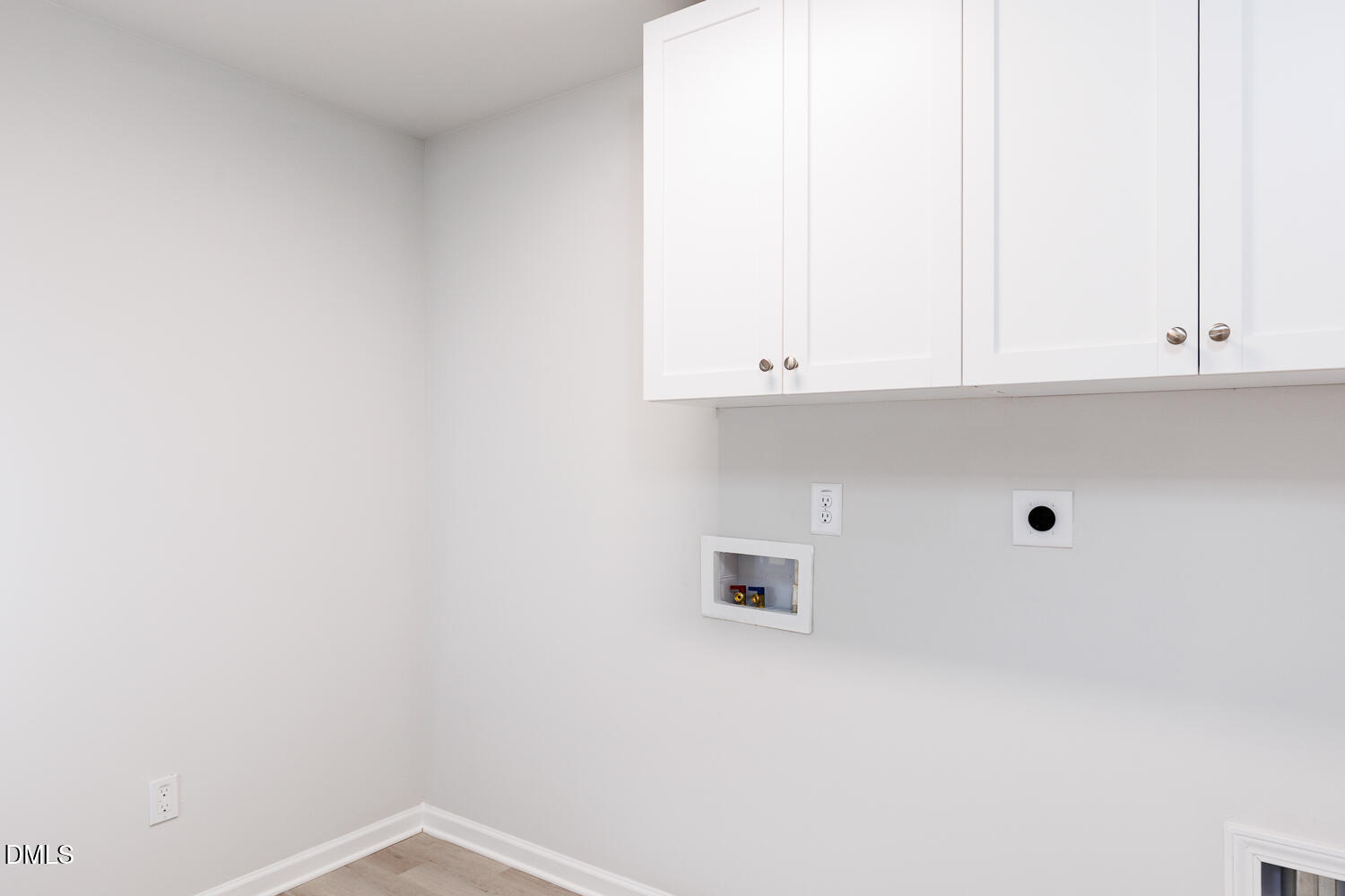 144 Siebold Street Garner, NC 27529 - Photo 23 of 40 a view of kitchen with white cabinets