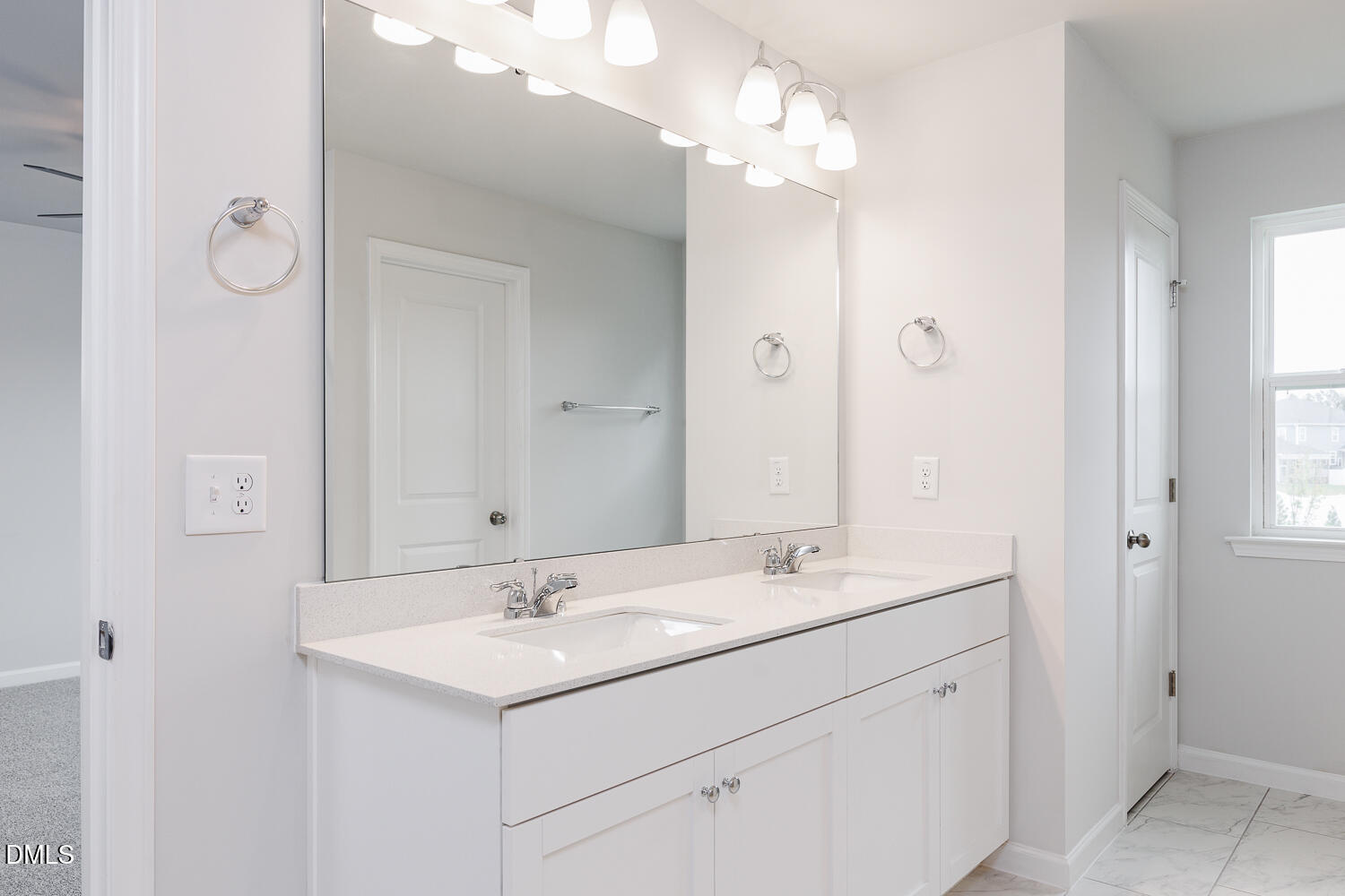144 Siebold Street Garner, NC 27529 - Photo 29 of 40 a bathroom with a sink vanity and a mirror
